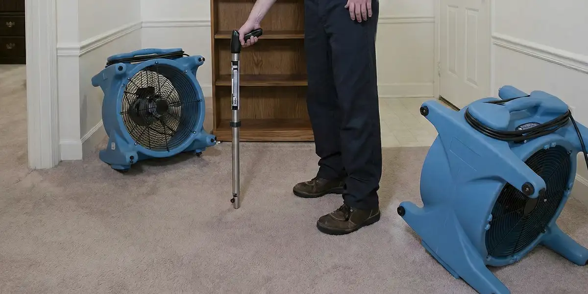 emergency water removal equipment deployed to dry a flooded residential interior in Indianapolis, IN